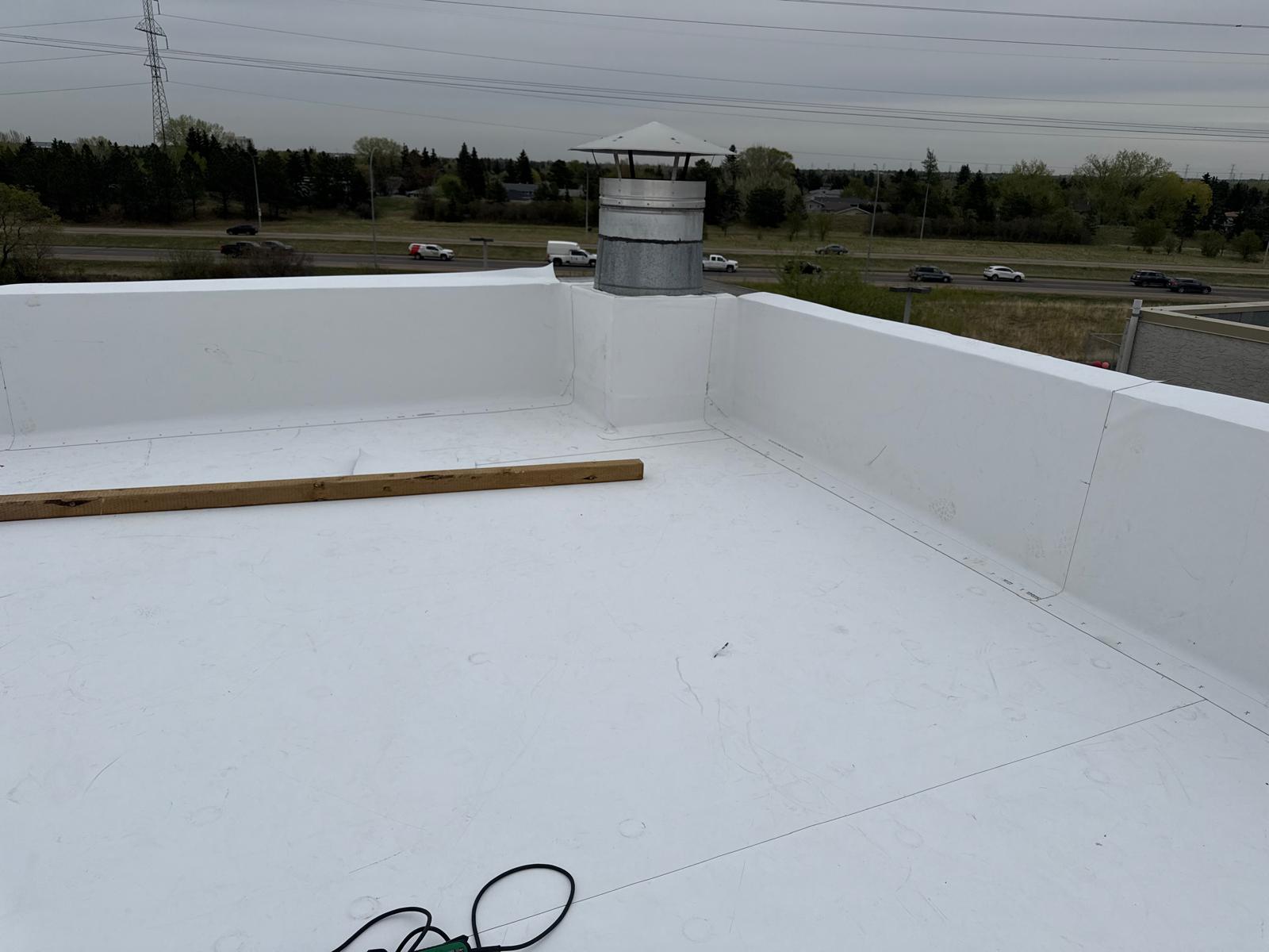 TPO membrane flat roof installation Edmonton